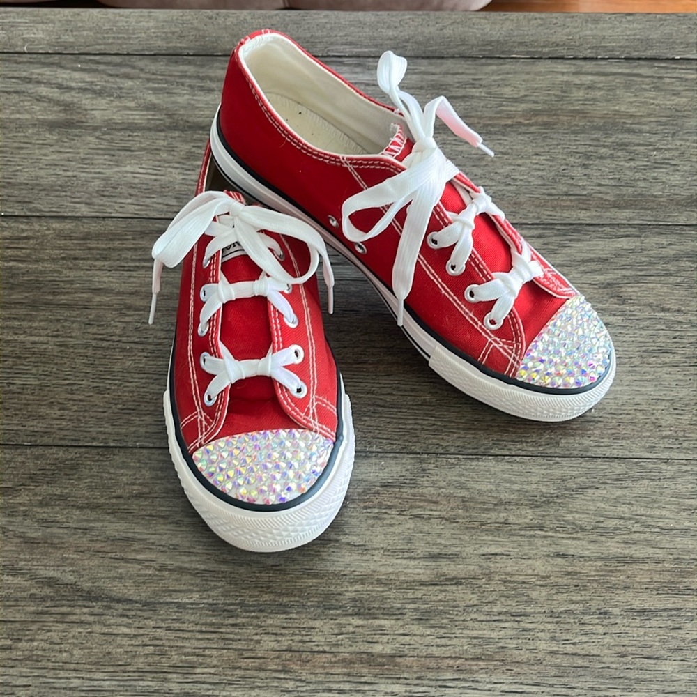 Worn once rhinestoned at the toe.
